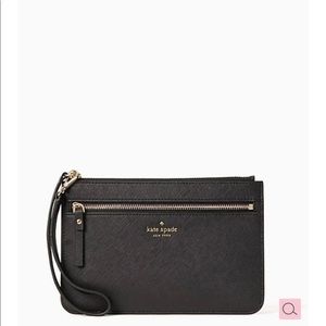 Brand new black Kate Spade Wristlet. Can comfortably fit an iPhone.